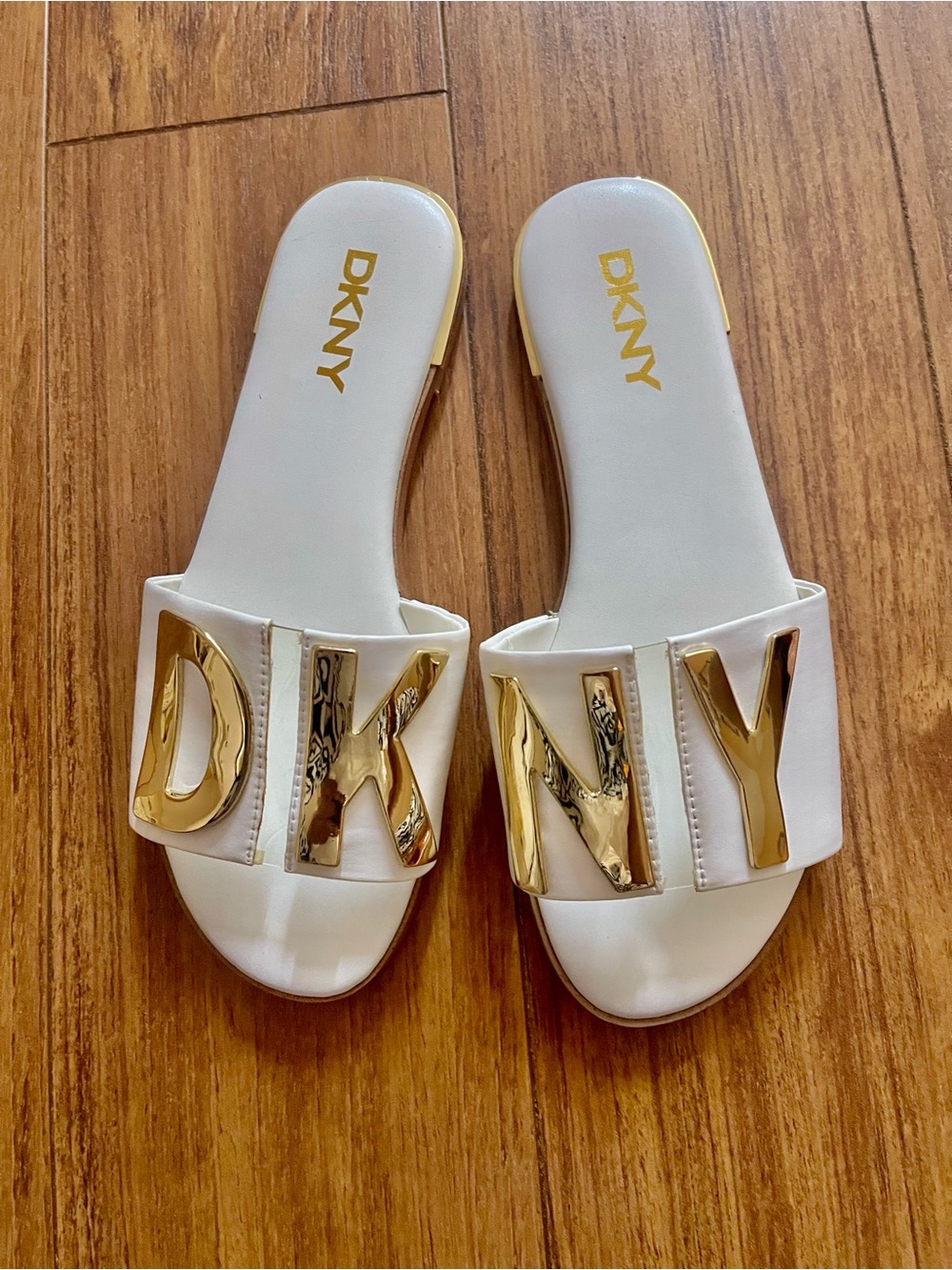 DKNY White Slide Sandals with Gold Lettering